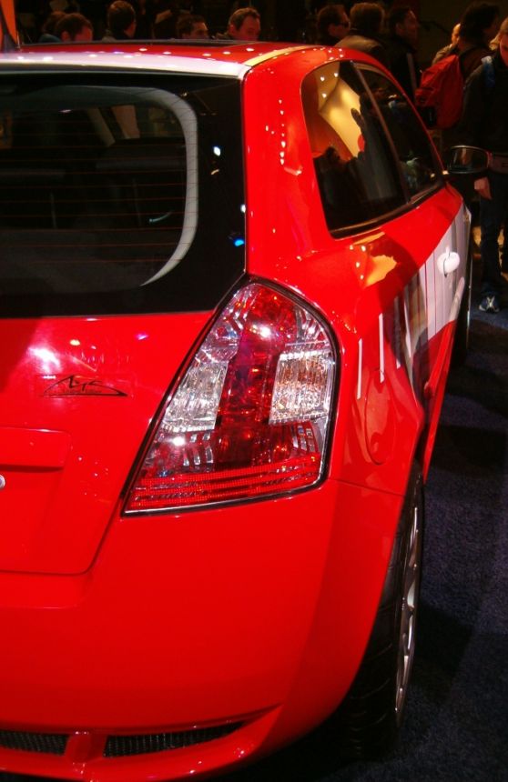 Red is the colour of racing and red was also the colour of the area at this month's Bologna Motor Show that housed two flame red Fiat Stilo 'M. Schumacher' cars