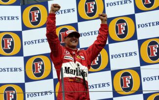 Michael Schumacher celebrates victory in Australia