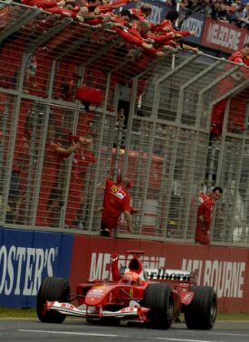 Michael Schumacher crosses the finish line in Australia