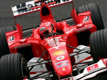 Michael Schumacher on his way to second position on the grid at a rain-hit Spa