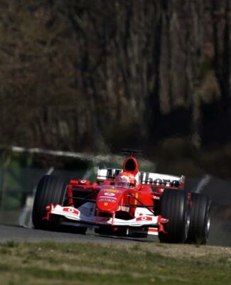 Michael Schumacher at the wheel of the new Ferrari F2004 at Mugello this week