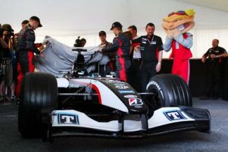 Minardi present their new 2004 Formula 1 car in Melbourne ahead of this weekend's Australian Grand Prix