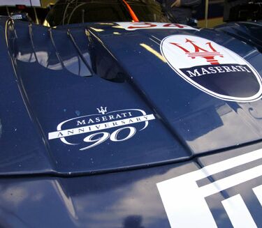 The logo of the weekend 90th Anniversary that will see Modena models from all epochs taking part, will appear on the FIA GT Championship Maserati MC12s which will be competing at Oschersleben