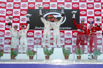 Mika Salo & Andrea Bertolini celebrate victory on the podium at Zuhai, joined by their Maserati team-mates Johnny Herbert & Fabrizio De Simone, & the drivers of the third placed BMS Ferrari, Matteo Bobbi & Gabriele Gardel