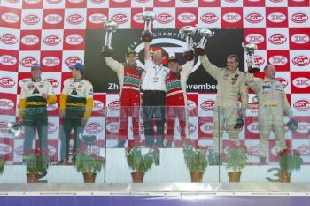 Christian Pescatori & Jaime Melo celebrate N-GT class victory on the podium at Zuhai, joined by the second & third placed Porsche crew's: Maasen/Luhr & Vonka/Konopka