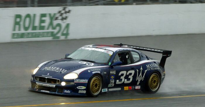 Scuderia Ferrari of Washington Maserati GT Light races through the rain at Daytona.