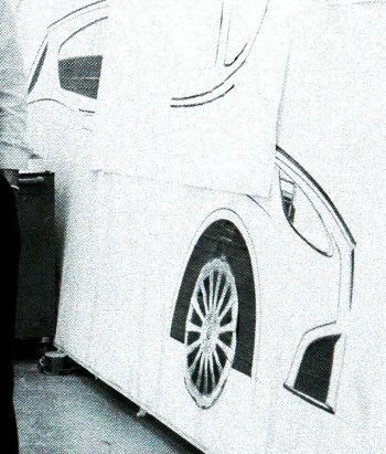 A 1:1 scale tape drawing of an Alfa Romeo, possibly a Kamal proposal. The 147 replacement uses a combination of sharp and soft curves, broadly similar in effect to the new BMW 1-series, although Alfa  Romeo  have  been  more  successful 