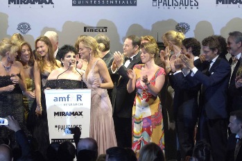 An Alfa Romeo GT, donated by the Italian car maker to raise money for the 'Cinema against Aids' charity, was auctioned at the "Moulins de Mougins" by Sharon Stone and Lapo Elkann