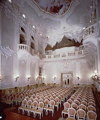 Count Guido Chigi Saracini commissioned architect Arturo Viligiardi to restoration the Palazzo, an undetaking which was to also include a new, rococo style, concert hall