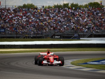 Michael Schumacher and Rubens Barrichello scored a one-two for Scuderia Ferrari in the US Grand Prix earlier today , but only in extraordinary circumstances after all the Michelin running teams pitted right at the end of the  race  parade  lap