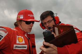 KIMI RAIKKONEN AND CHRIS DYER - 2009 BRITISH GRAND PRIX, SILVERSTONE