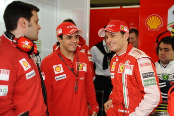 GIANCARLO FISICHELLA AND FELIPE MASSA IN THE FERRARI GARAGE, INTERLAGOS, BRAZIL, 2009