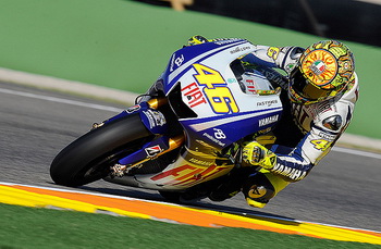 Valentino Rossi and Jorge Lorenzo finished second and third in the season-ending Grand Prix of Valencia on Sunday afternoon, the ninth time the pair have shared the podium this season. It ensured that Yamaha won the Triple Crown for the second year running after Rossi took the Riders' title, Fiat Yamaha the Teams' and Yamaha the Constructors'.