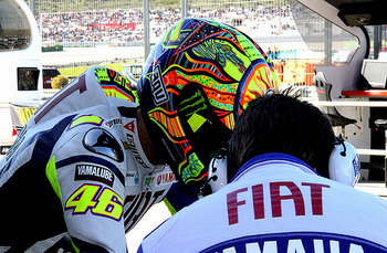 Valentino Rossi and Jorge Lorenzo finished second and third in the season-ending Grand Prix of Valencia on Sunday afternoon, the ninth time the pair have shared the podium this season. It ensured that Yamaha won the Triple Crown for the second year running after Rossi took the Riders' title, Fiat Yamaha the Teams' and Yamaha the Constructors'.