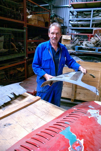 Southwards Museum restorations manager John Bellamore with the Maseratis engine covers. The car has undergone a massive restoration to bring it back to racing strength.