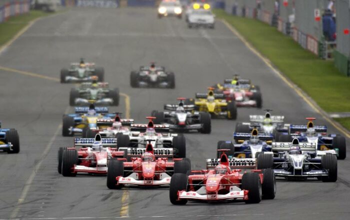 Pole sitter Michael Schumacher leads Ferrari team mate Rubens Barrichello into the first corner in Australia