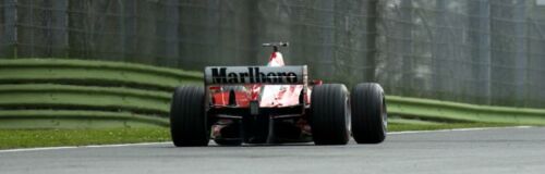 Michael Schumacher on his way to victory in the 2003 San Marino Grand Prix