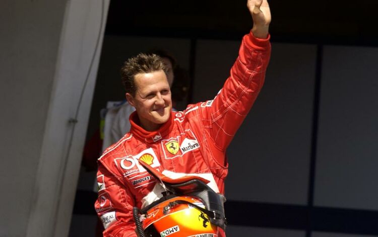 Michael Schumacher celebrates his third consecutive win of the year at the A1-Ring in Austria