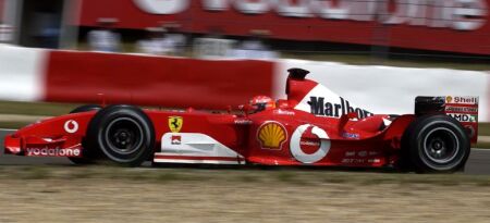 Michael Schumacher in his Ferrari F2003-GA on his way to fifth place in the 2003 European Grand Prix at the Nurburgring