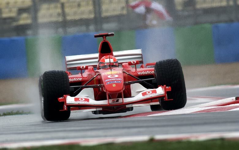 Michael Schumacher during the wet first qualifying session at Magny Cours