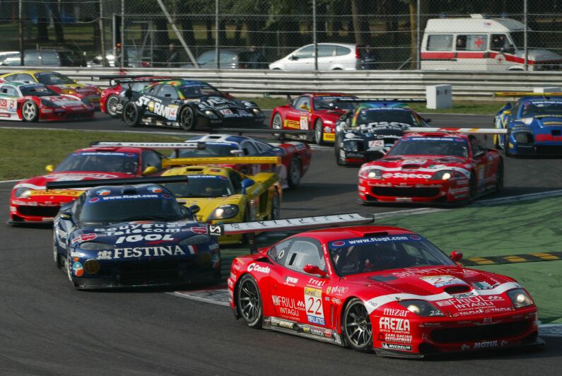 The 22 BMS Ferrari 550 Maranello leads the field away at the start in Monza