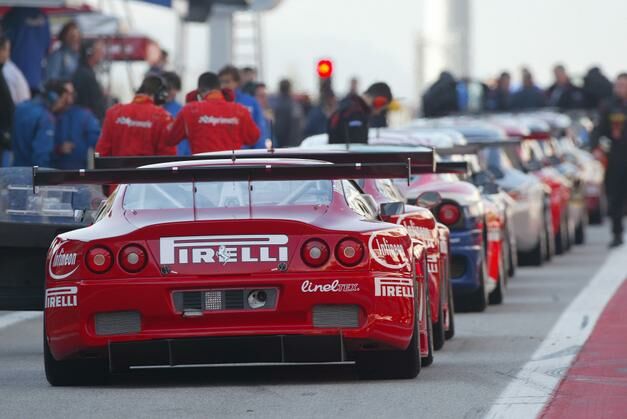 the Scuderia Italia Ferrari 550's wait to leave the pitlane during qualifying for round 1 in Barcelona