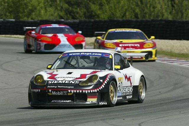 N-GT race action: Stepane Ortelli's Fresigner Motorsport Porsche 996GT3-RS leads the chasing JMB Racing and Team Maranello Concessionaires Ferrari 360 Modenas