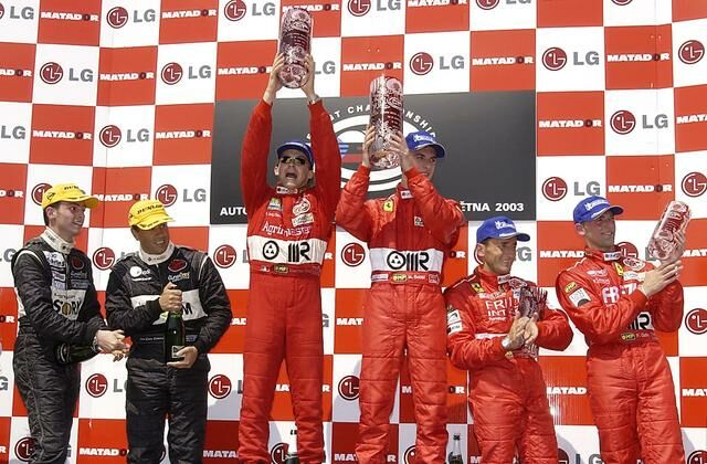 Thomas Biagi and Matteo Bobbi celebrate winning their fourth consecutive FIA GT race at Brno yesterday, a win that extends their commanding lead at the top of the FIA GT Driver's Championship table