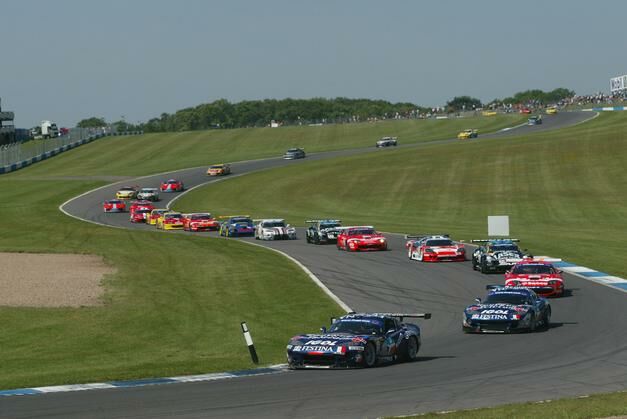 the Force One Festina Chrysler Vipers lead the field around the first lap at Donington Park