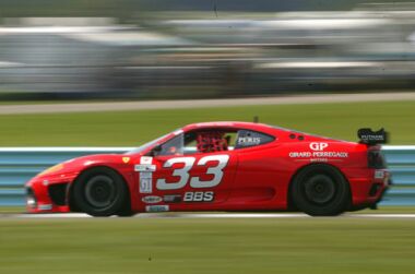 The Scuderia Ferrari of Washington 360 Modena of Cort Wagner and Brent Martini on its way to winning the GT class in the Bully Hills Vineyards 250 at Watkins Glen