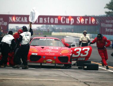 The Scuderia Ferrari of Washington 360 Modena of Cort Wagner and Brent Martini on its way to winning the GT class in the Bully Hills Vineyards 250 at Watkins Glen