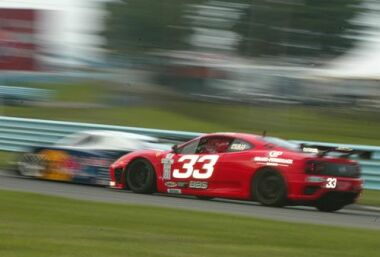 The Scuderia Ferrari of Washington 360 Modena of Cort Wagner and Brent Martini on its way to winning the GT class in the Bully Hills Vineyards 250 at Watkins Glen