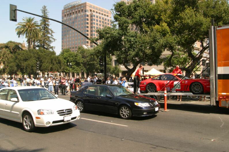 The Care Prodrive Ferrari team taking part in pre-race activities in San Jose