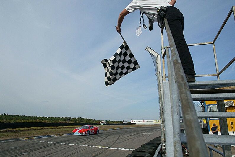 The 88 Team Maranello Concessionaires Ferrari 360 Modena takes the chequered flag at Anderstorp