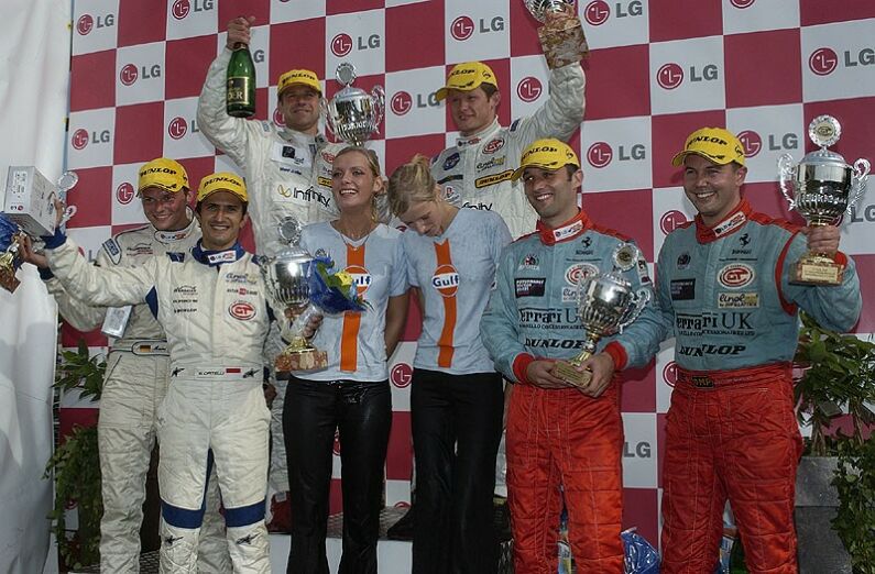 Jamie Davies and Darren Turner on the N-GT podium in Sweden yesterday