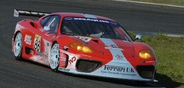 Jamie Davies and Darren Turner on their way to qualifying the TMC Ferrari 360 Modena second at Estoril