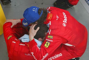 Thomas Biagi and Matteo Bobbi celebrate winning the 2003 FIA GT Driver's Championship at Estoril yesterday