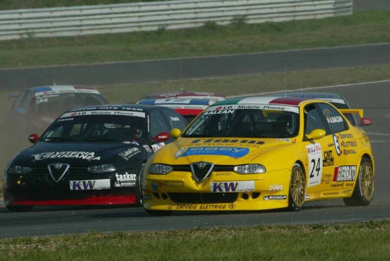 The Alfa Romeos of Alessandro Balzan and Fabio Francia dispute position at Oschersleben