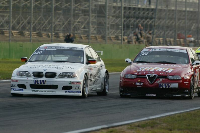 Gabriele Tarquini and Jorg Muller fight it out for the title at Monza on Sunday