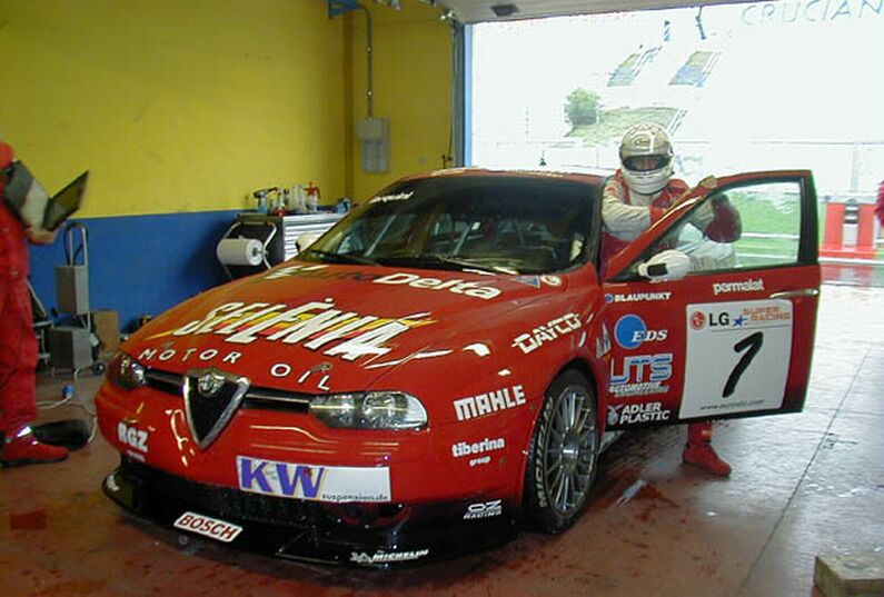 Gabriele Tarquini sports the no 1 on his Alfa Romeo 156GTA during the rain shortened Michelin tyre test