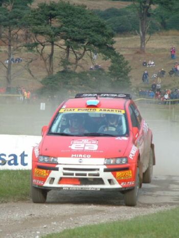 Micro Baldacci in his Fiat Punto Abarth Rally on his way to second place in the Junior category on the Wales Rally GB